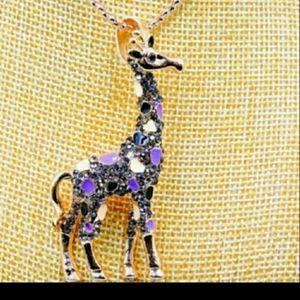 Lovely Long goldtone necklace. 38"  with enamel/crystal Giraffe pendant!!